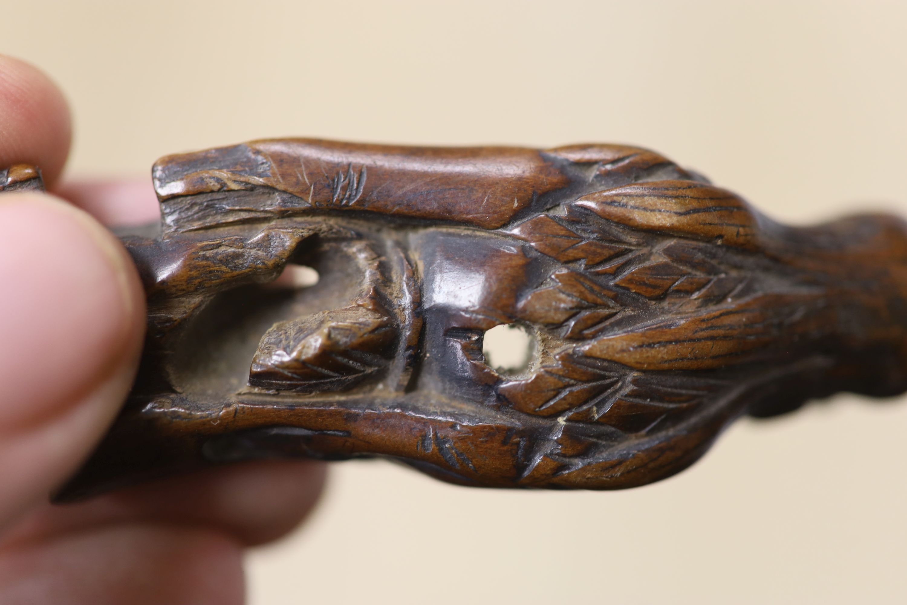 A small miscellaneous Oriental collection including enamel snuff boxes, Buddha carvings etc.